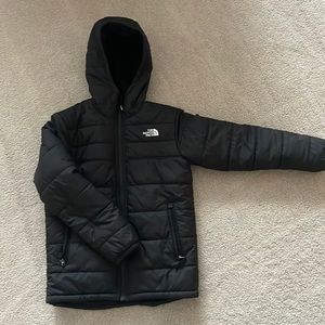 Boys size medium reversible north face winter jacket.